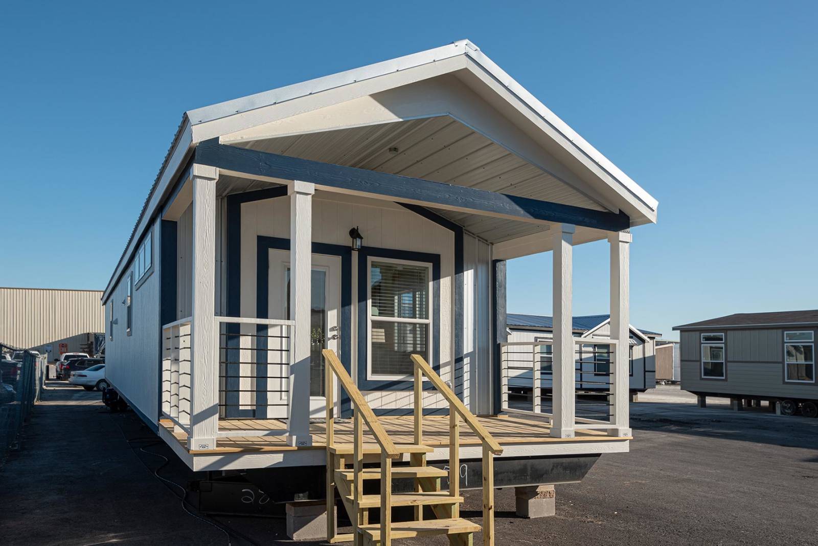 Diamond D1662C manufactured-home exterior; model example, features and finishes vary